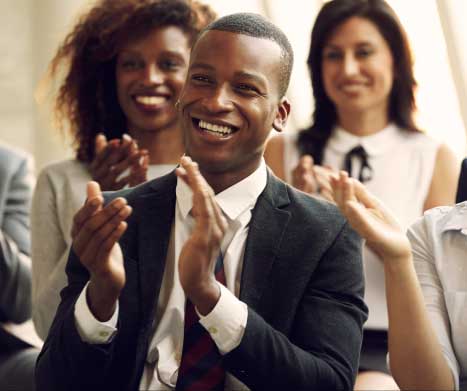 group of business people applauding